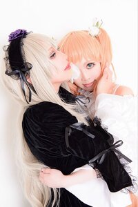 Rating: Safe Score: 0 Tags: 2girls blonde_hair blue_eyes dress gothic_lolita lace lips lolita_fashion long_hair multiple_cosplay multiple_girls realistic ribbon sisters striped tagme User: admin