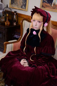 Rating: Safe Score: 0 Tags: 1girl bangs blonde_hair blue_eyes bonnet chair dress flower gothic_lolita indoors lolita_fashion long_hair long_sleeves looking_at_viewer painting_(object) red_dress rose shinku sitting solo User: admin