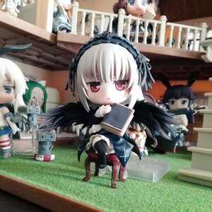 Rating: Safe Score: 0 Tags: blonde_hair blue_eyes book doll dress hairband long_hair multiple_girls red_eyes sitting solo suigintou white_hair wings User: admin