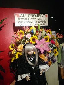 Rating: Safe Score: 0 Tags: 1girl doll dress flower hair_over_one_eye long_hair looking_at_viewer red_eyes solo suigintou sunflower very_long_hair yellow_flower User: admin