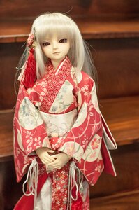 Rating: Safe Score: 0 Tags: 1girl doll floral_print hair_ornament indoors japanese_clothes kimono long_hair looking_at_viewer red_eyes solo suigintou white_hair wide_sleeves User: admin