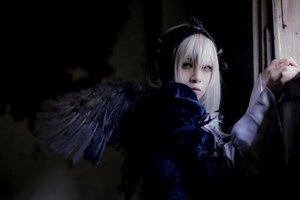 Rating: Safe Score: 0 Tags: 1girl closed_mouth feathered_wings feathers looking_at_viewer solo suigintou upper_body wings User: admin