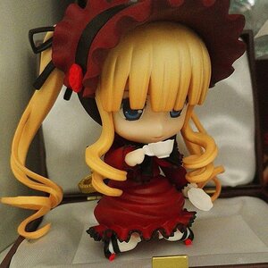 Rating: Safe Score: 0 Tags: 1girl blonde_hair blue_eyes bow doll dress drill_hair frills hat long_hair red_dress shinku sitting solo User: admin