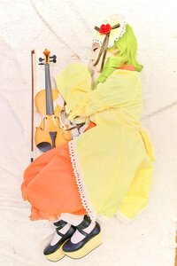 Rating: Safe Score: 0 Tags: 1girl brown_hair closed_eyes dress flower frills green_hair hair_flower hair_ornament instrument kanaria long_sleeves musical_note red_flower shoes sitting solo yellow_dress User: admin