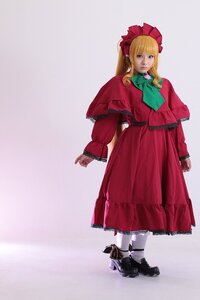 Rating: Safe Score: 0 Tags: 1girl blonde_hair blue_eyes bow capelet dress full_body green_neckwear long_hair long_sleeves red_dress shinku solo User: admin