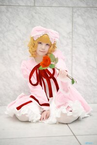 Rating: Safe Score: 0 Tags: 1girl blonde_hair blue_eyes dress flower hat hinaichigo lips long_sleeves red_flower ribbon rose short_hair sitting solo User: admin