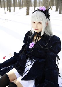 Rating: Safe Score: 0 Tags: 1girl black_legwear choker flower gothic_lolita hair_flower hair_ornament hairband lips lolita_fashion long_hair long_sleeves red_eyes sitting solo thighhighs white_hair User: admin