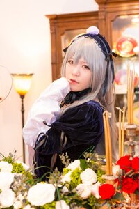 Rating: Safe Score: 0 Tags: 1girl blurry blurry_background blurry_foreground depth_of_field flower hairband head_rest lips long_hair long_sleeves looking_at_viewer red_eyes rose sitting solo suigintou white_flower User: admin
