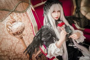 Rating: Safe Score: 0 Tags: 1girl black_dress black_wings dress feathers flower frills gothic_lolita holding lolita_fashion long_hair long_sleeves looking_at_viewer red_eyes rose solo suigintou umbrella white_hair wings User: admin