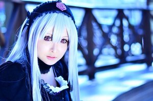 Rating: Safe Score: 0 Tags: 1girl blurry blurry_background blurry_foreground closed_mouth depth_of_field flower frills gothic_lolita hairband lips lolita_fashion lolita_hairband long_hair looking_at_viewer purple_eyes silver_hair solo suigintou upper_body User: admin