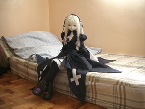 Rating: Safe Score: 0 Tags: 1girl boots doll dress hairband long_hair long_sleeves looking_at_viewer red_eyes sitting solo suigintou wings User: admin