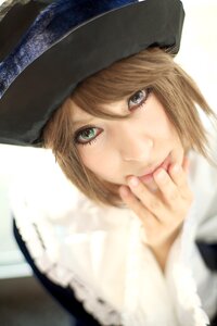 Rating: Safe Score: 0 Tags: 1girl bangs blonde_hair blurry closed_mouth depth_of_field hat lips looking_at_viewer nail_polish short_hair smile solo souseiseki striped User: admin