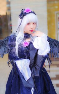 Rating: Safe Score: 0 Tags: 1girl bangs blunt_bangs blurry blurry_background depth_of_field feathered_wings indoors lips long_hair long_sleeves looking_at_viewer nail_polish pants photo red_eyes red_lips solo standing suigintou wings User: admin