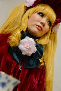 Rating: Safe Score: 0 Tags: 1girl bangs blonde_hair flower lips long_hair photo realistic rose shinku simple_background solo User: admin