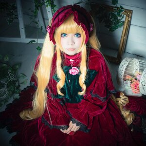 Rating: Safe Score: 0 Tags: 1girl blonde_hair blue_eyes bonnet dress drill_hair flower lolita_fashion long_hair long_sleeves looking_at_viewer red_dress rose shinku smile solo User: admin