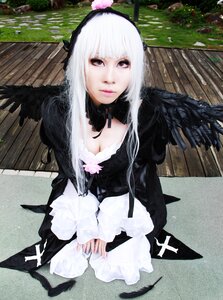 Rating: Safe Score: 0 Tags: 1girl auto_tagged bench black_wings breasts cleavage dress feathered_wings feathers from_above gothic_lolita hairband lips long_hair looking_at_viewer purple_eyes sitting solo suigintou v_arms wings User: admin