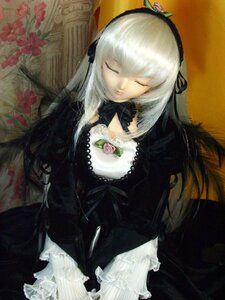 Rating: Safe Score: 0 Tags: 1girl closed_eyes doll dress flower frills hairband long_hair long_sleeves silver_hair solo suigintou traditional_media very_long_hair wings User: admin