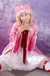Rating: Safe Score: 0 Tags: 1girl blonde_hair bow dress frills hair_bow hinaichigo lips looking_at_viewer pink_dress realistic sitting smile solo striped_legwear wide_sleeves User: admin