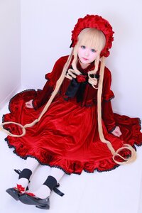 Rating: Safe Score: 0 Tags: 1girl blonde_hair blue_eyes bonnet dress flower lace lips lolita_fashion long_hair looking_at_viewer red_dress red_flower red_rose rose shinku sitting solo striped vertical_stripes User: admin