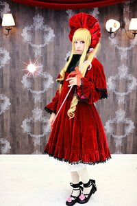 Rating: Safe Score: 0 Tags: 1girl blonde_hair blue_eyes bonnet dress long_hair red_dress shinku snow solo standing umbrella User: admin