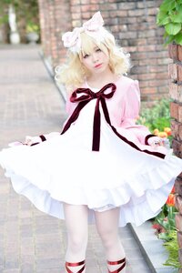 Rating: Safe Score: 0 Tags: 1girl animal_ears blonde_hair blurry blurry_background day depth_of_field dress fox_ears hinaichigo outdoors ribbon solo standing striped vertical_stripes white_dress white_legwear User: admin