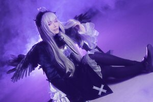 Rating: Safe Score: 0 Tags: 1girl black_wings dress feathered_wings feathers frills long_hair long_sleeves sitting solo suigintou wings User: admin