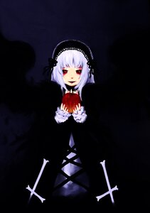 Rating: Safe Score: 0 Tags: 1girl black_background dress frills hairband holding holding_food holding_fruit image long_sleeves looking_at_viewer red_eyes silver_hair solo suigintou wings User: admin