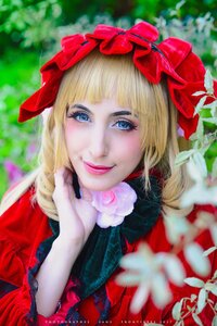 Rating: Safe Score: 0 Tags: 1girl bangs blonde_hair blue_eyes blunt_bangs blurry blurry_background blurry_foreground bow depth_of_field eyelashes flower lips looking_at_viewer makeup nose realistic ribbon rose shinku smile solo upper_body User: admin