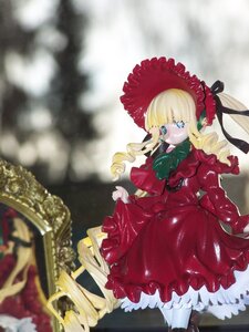 Rating: Safe Score: 0 Tags: 1girl bangs blonde_hair blue_eyes blurry blurry_background bonnet bow depth_of_field doll dress drill_hair frills long_hair long_sleeves looking_at_viewer red_dress shinku solo standing twin_drills twintails User: admin