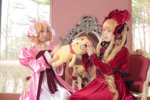 Rating: Safe Score: 0 Tags: 1boy 1girl blonde_hair blue_eyes dress flower long_hair multiple_cosplay realistic shinku sitting tagme twintails User: admin