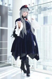 Rating: Safe Score: 0 Tags: 1girl bangs black_footwear blunt_bangs boots building dress flower full_body long_hair long_sleeves looking_at_viewer red_eyes solo standing suigintou User: admin