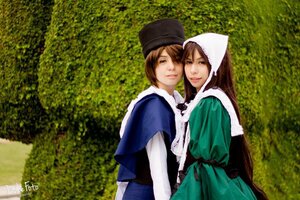 Rating: Safe Score: 0 Tags: 2girls blue_dress brown_hair dress green_dress green_eyes hat head_scarf lips long_hair long_sleeves looking_at_viewer multiple_cosplay multiple_girls outdoors sisters suiseiseki tagme User: admin