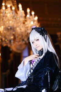 Rating: Safe Score: 0 Tags: 1girl bangs black_dress black_ribbon blurry blurry_background bokeh closed_mouth depth_of_field dress gothic_lolita hairband long_hair long_sleeves looking_at_viewer red_eyes ribbon silver_hair solo suigintou upper_body User: admin