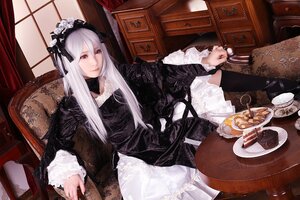 Rating: Safe Score: 0 Tags: 1girl black_dress chair cup dress frills gothic_lolita hairband indoors lolita_fashion lolita_hairband long_hair long_sleeves looking_at_viewer red_eyes rose silver_hair sitting solo suigintou table teacup white_hair User: admin