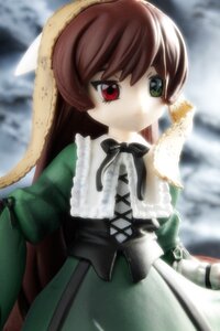 Rating: Safe Score: 0 Tags: 1girl blurry blurry_background brown_hair depth_of_field doll dress frills green_dress green_eyes hat heterochromia long_hair long_sleeves looking_at_viewer outdoors red_eyes solo suiseiseki User: admin