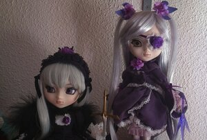 Rating: Safe Score: 0 Tags: 2girls doll dress eyepatch flower long_hair looking_at_viewer multiple_dolls multiple_girls purple_eyes purple_flower silver_hair suigintou tagme User: admin