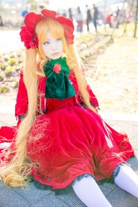 Rating: Safe Score: 0 Tags: 1girl blonde_hair blue_eyes blurry blurry_background bonnet bow bowtie depth_of_field dress flower long_hair long_sleeves pantyhose photo red_dress shinku sitting solo very_long_hair white_legwear User: admin