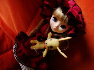 Rating: Safe Score: 0 Tags: 1girl blonde_hair blue_eyes bow doll dress long_hair red_dress shinku sitting solo stuffed_animal User: admin