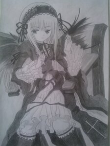 Rating: Safe Score: 0 Tags: 1girl auto_tagged chair dress frilled_sleeves frills greyscale hairband image long_hair long_sleeves monochrome photo ribbon solo suigintou traditional_media very_long_hair wings User: admin