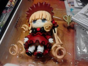Rating: Safe Score: 0 Tags: 1girl auto_tagged blonde_hair blue_eyes blurry bow depth_of_field doll dress figure frills long_hair photo red_dress shinku sitting solo twintails very_long_hair User: admin