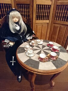 Rating: Safe Score: 0 Tags: 1girl blonde_hair closed_eyes cup doll dress hair_over_one_eye indoors long_hair plate sitting solo suigintou table tea teacup User: admin