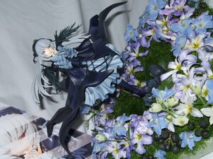 Rating: Safe Score: 0 Tags: 1girl black_wings boots dress finger_to_mouth flower frilled_sleeves frills hairband image long_hair long_sleeves looking_at_viewer red_eyes ribbon silver_hair solo suigintou white_flower wings User: admin