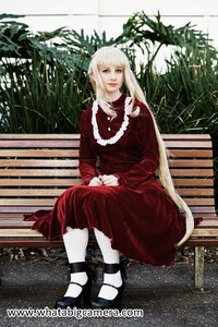 Rating: Safe Score: 0 Tags: 1girl blonde_hair dress lips long_hair realistic shinku sitting solo User: admin