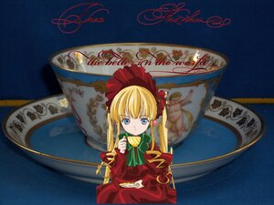 Rating: Safe Score: 0 Tags: 1girl blonde_hair blue_eyes bonnet bow bowtie cup dress flower green_bow image in_container long_hair long_sleeves looking_at_viewer red_dress saucer shinku sitting solo teacup twintails User: admin