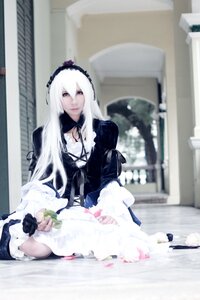 Rating: Safe Score: 0 Tags: 1girl blurry depth_of_field dress flower frills gothic_lolita hairband lolita_fashion long_hair long_sleeves looking_at_viewer photo red_eyes sitting solo suigintou white_hair User: admin