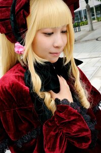 Rating: Safe Score: 0 Tags: 1girl bangs blonde_hair bow dress eyelashes lace lips long_hair long_sleeves realistic red_dress shinku solo User: admin