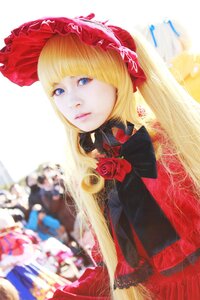 Rating: Safe Score: 0 Tags: 1girl bangs blonde_hair blue_eyes blurry blurry_background blurry_foreground bow depth_of_field flower lips long_hair looking_at_viewer shinku solo upper_body User: admin