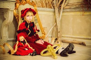 Rating: Safe Score: 0 Tags: 1girl blonde_hair blue_eyes bonnet dress long_hair long_sleeves looking_at_viewer red_dress rose shinku sitting solo User: admin