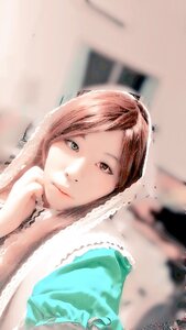 Rating: Safe Score: 0 Tags: 1girl artist_name blurry blurry_background brown_eyes brown_hair closed_mouth depth_of_field fur_trim lips long_hair looking_at_viewer photo solo suiseiseki User: admin