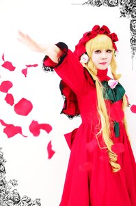 Rating: Safe Score: 0 Tags: 1girl blonde_hair bonnet bow dress drill_hair flower long_hair red_dress rose shinku solo User: admin